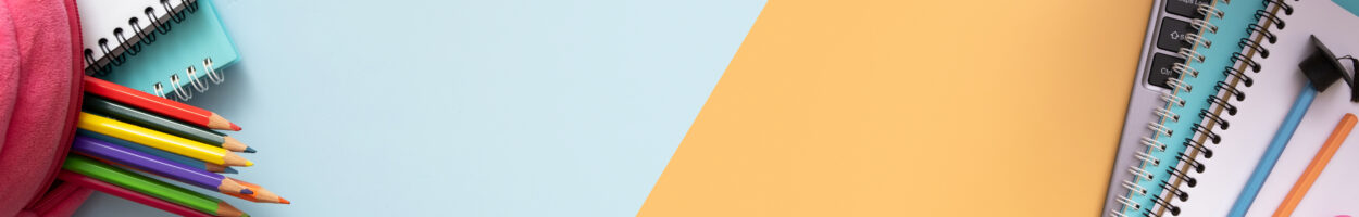 Colorful stationary with backpack on colored background. Copy space. Top view, flat lay.